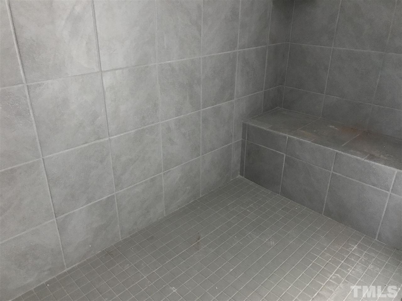 2516 Rambling Creek Road, Unit 28 Apex, NC 27523 - Photo 9 of 29 Huge walk-in shower with ceramic tile walls and floor.