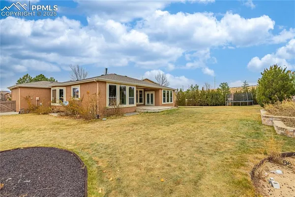 an aerial view of residential house with outdoor space
