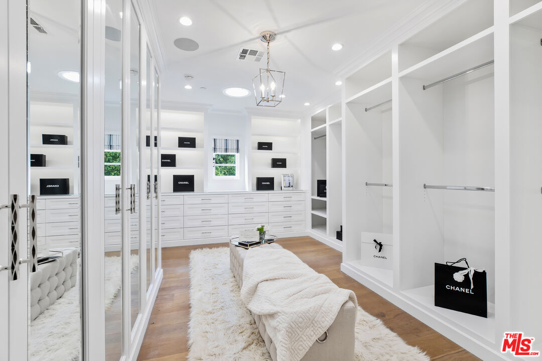 623 Walden Drive Beverly Hills, CA 90210 - Photo 14 of 28 a large bathroom with a glass shower door