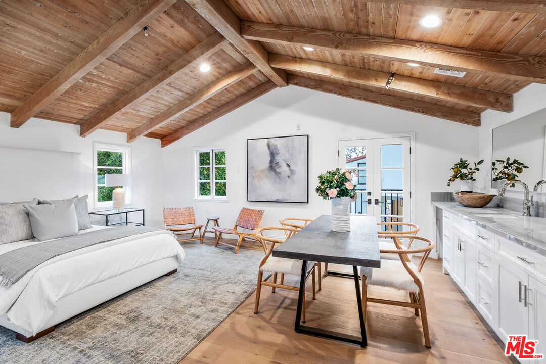 623 Walden Drive Beverly Hills, CA 90210 - Photo 27 of 28 a living room with furniture and wooden floor