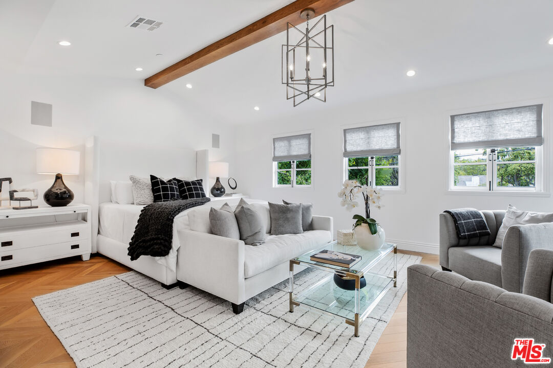 623 Walden Drive Beverly Hills, CA 90210 - Photo 10 of 28 a living room with furniture and wooden floor