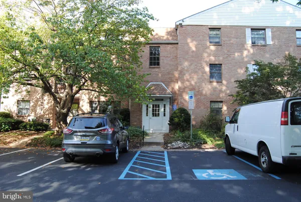 a car parked in front of a house