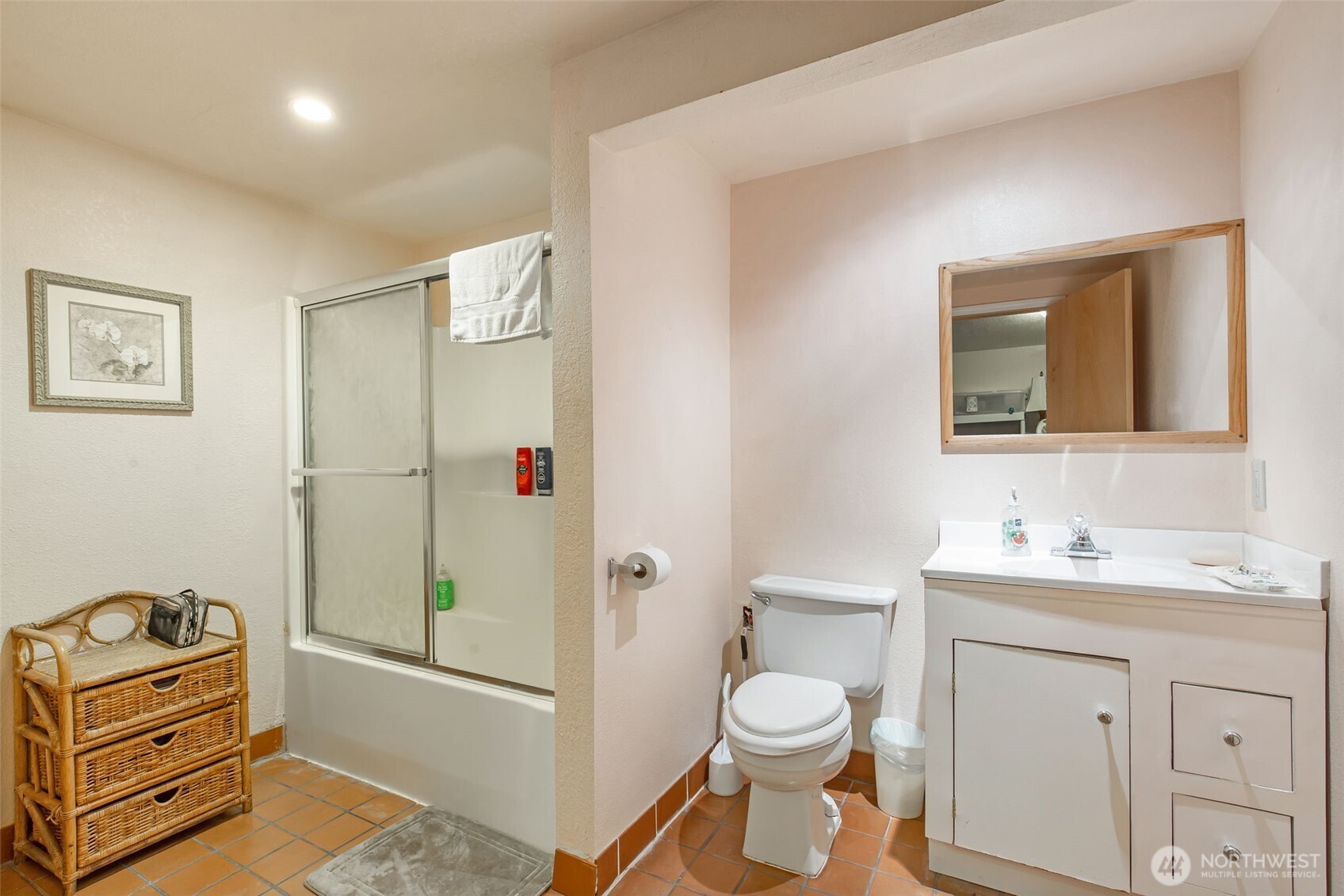 1497 Old Military Road Southeast Tenino, WA 98589 - Photo 12 of 34 a bathroom with a toilet a sink and a mirror