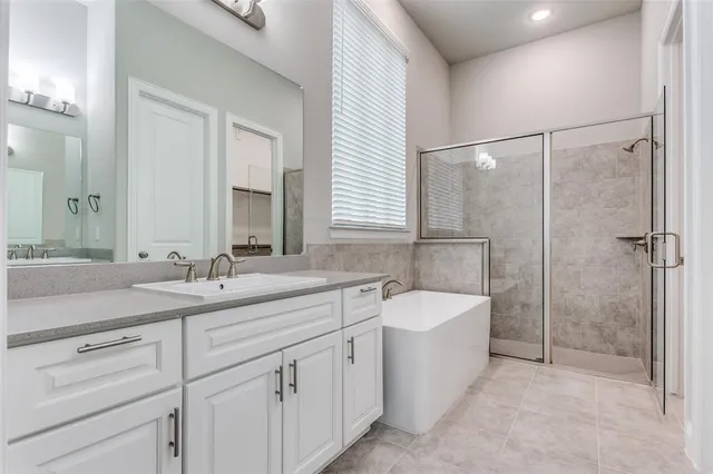 a bathroom with a sink and a bathtub