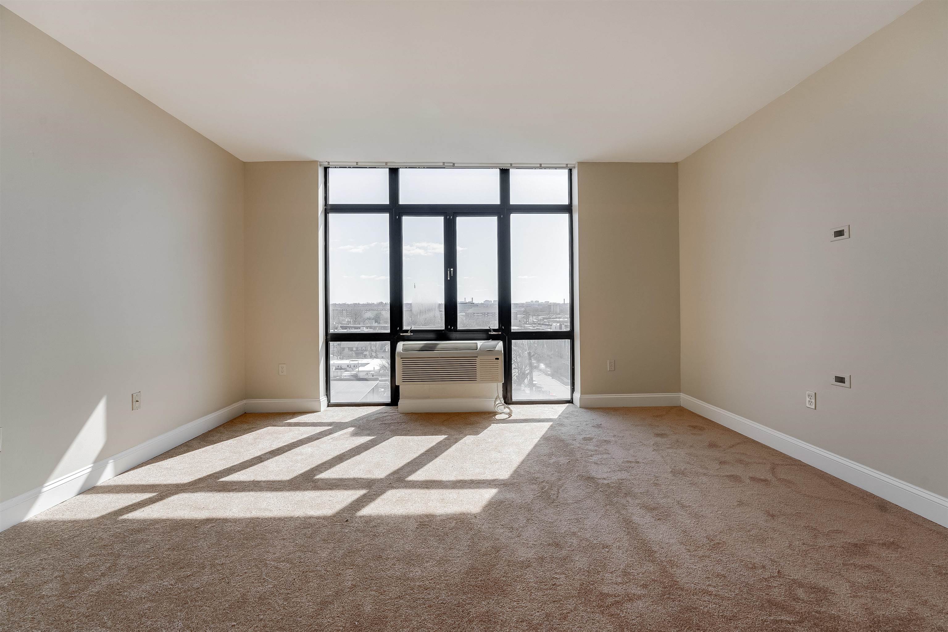 29 1st Street, Unit 401 Hackensack, NJ 07601 - Photo 15 of 23 a view of an empty room with a window