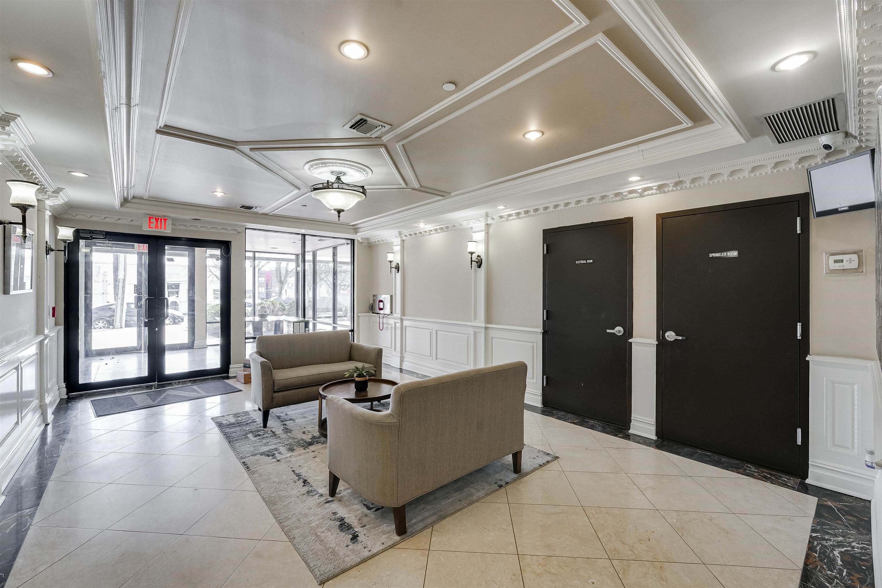 29 1st Street, Unit 401 Hackensack, NJ 07601 - Photo 20 of 23 a living room with furniture