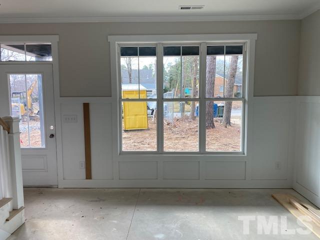 1133 Benning Street Durham, NC 27704 - Photo 15 of 22 a view of an empty room with a window
