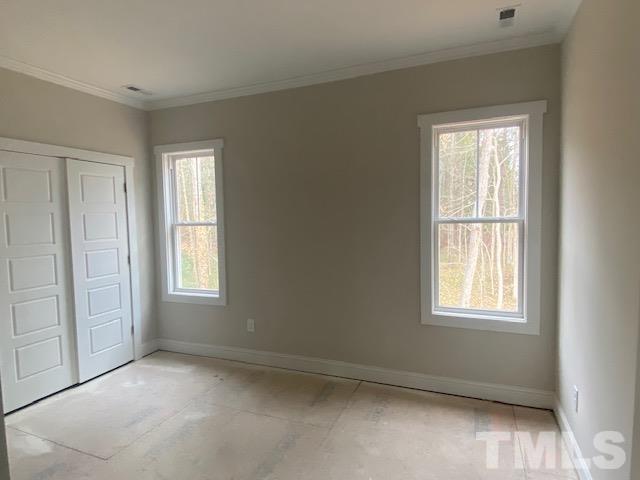 1133 Benning Street Durham, NC 27704 - Photo 17 of 22 an empty room with windows