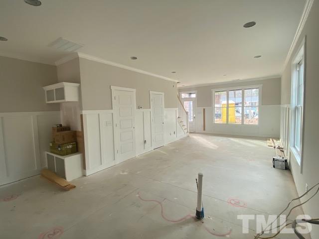 1133 Benning Street Durham, NC 27704 - Photo 18 of 22 a view of empty room with wooden floor and fan