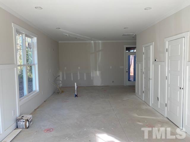 1133 Benning Street Durham, NC 27704 - Photo 3 of 22 a view of an empty room with a window