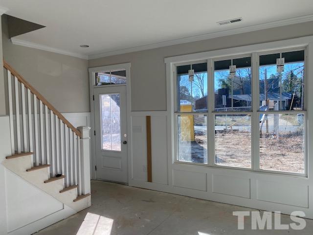1133 Benning Street Durham, NC 27704 - Photo 7 of 22 a view of an entryway with a floor to ceiling window