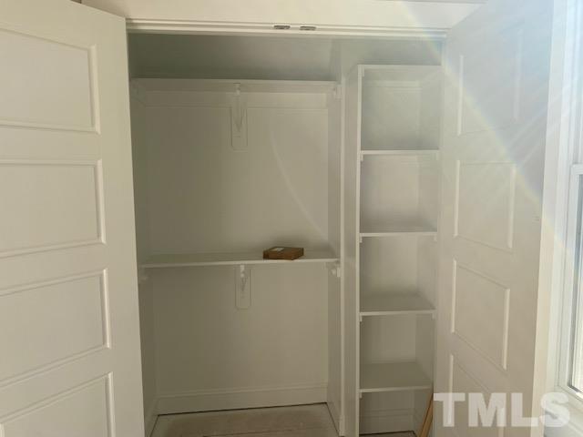 1133 Benning Street Durham, NC 27704 - Photo 9 of 22 a bathroom with a glass shower door