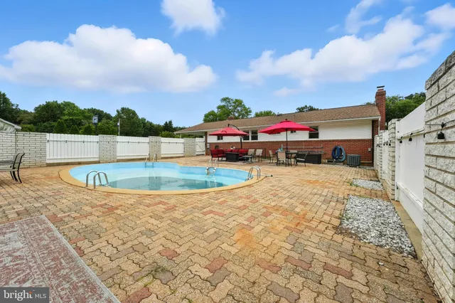 a view of backyard with green space