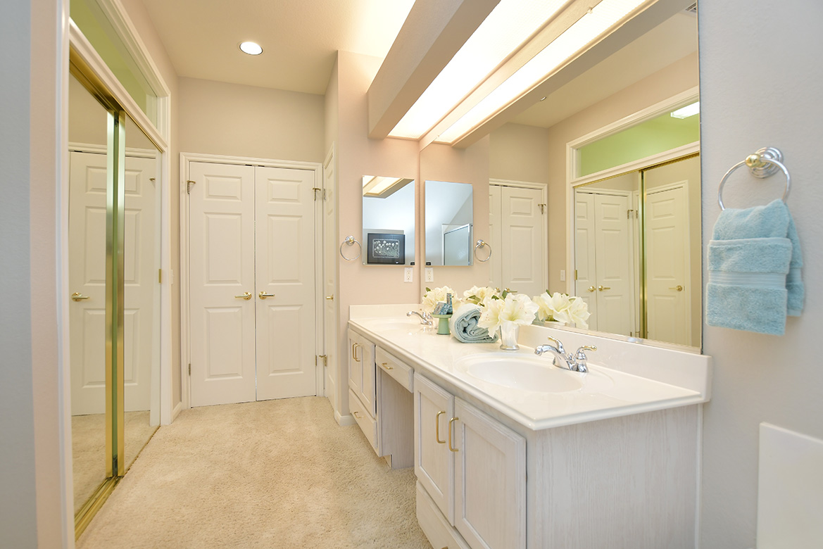 114 Lone Star Drive Georgetown, TX 78633 - Photo 21 of 30 Double sinks and ample counter space is available for daily routines. Transom windows allow in extra light.