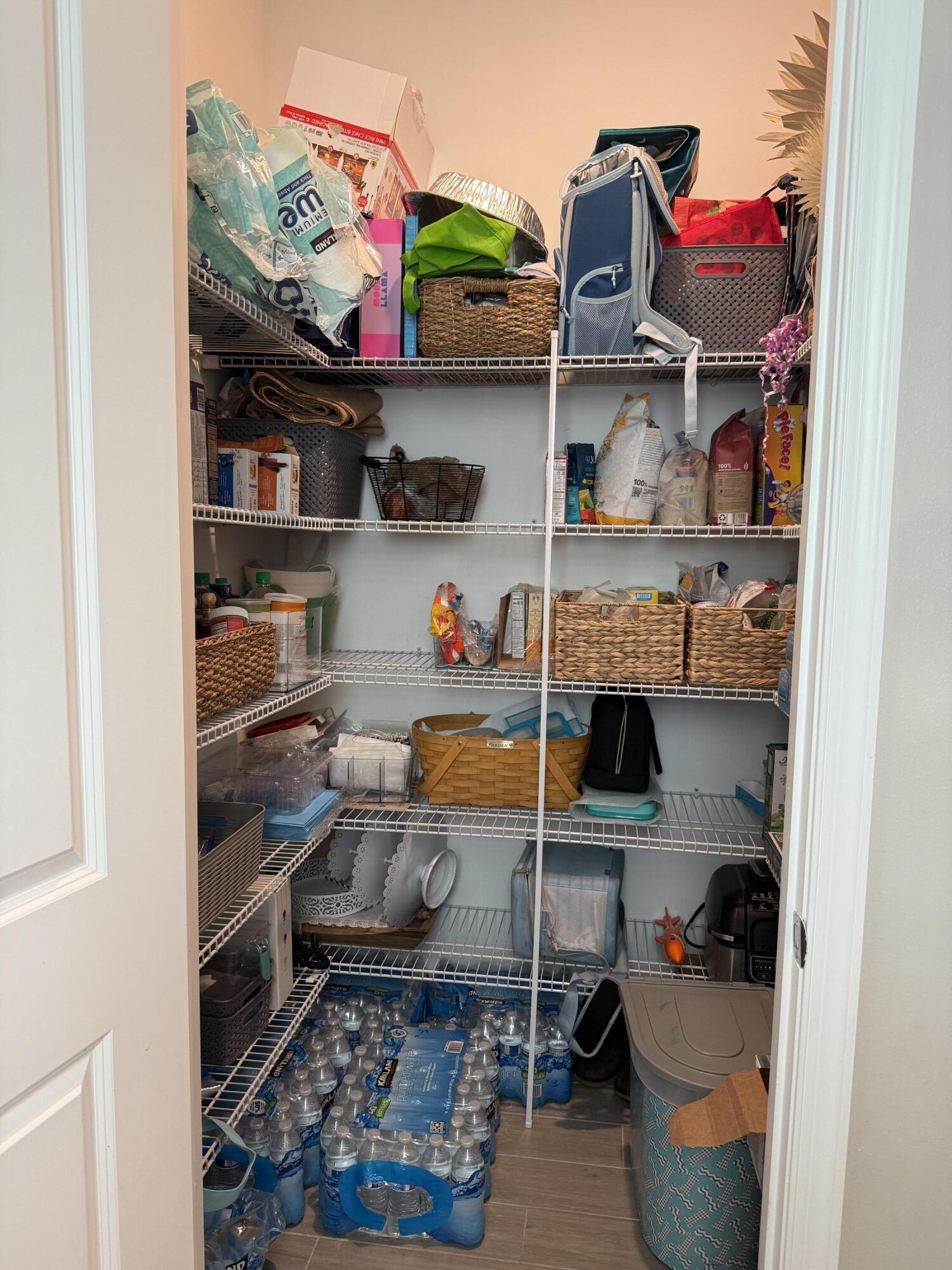 1382 Arrowhead Point Road Loxahatchee, FL 33470 - Photo 27 of 55 a room with storage and utility