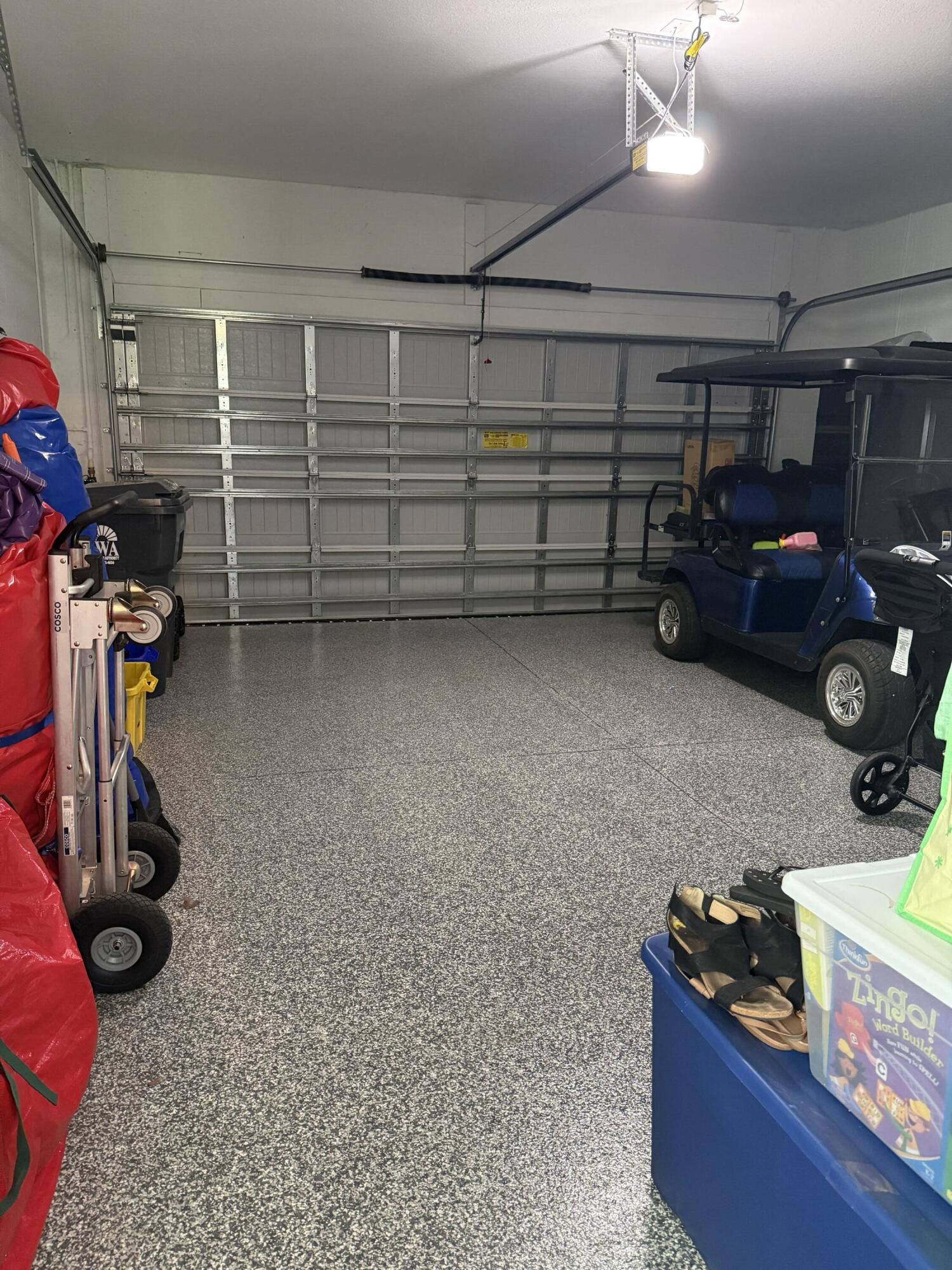 1382 Arrowhead Point Road Loxahatchee, FL 33470 - Photo 29 of 55 a view of car garage