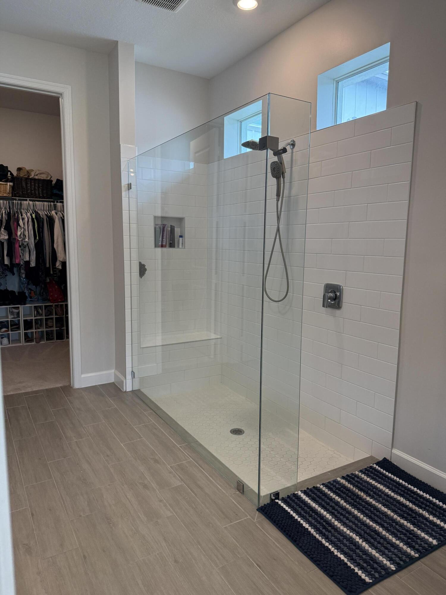 1382 Arrowhead Point Road Loxahatchee, FL 33470 - Photo 34 of 55 a bathroom with a shower