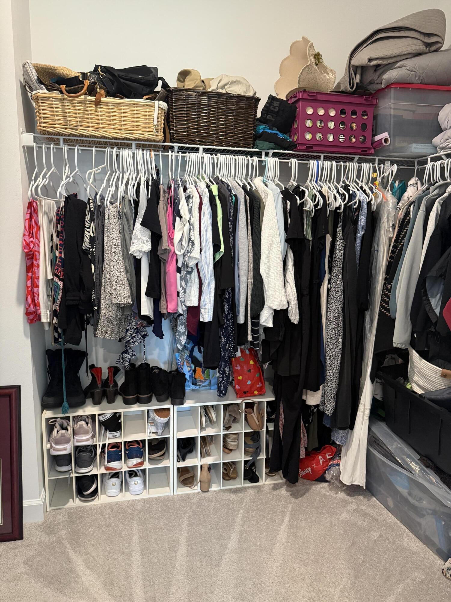 1382 Arrowhead Point Road Loxahatchee, FL 33470 - Photo 35 of 55 a view of walk in closet with clothes and shoes