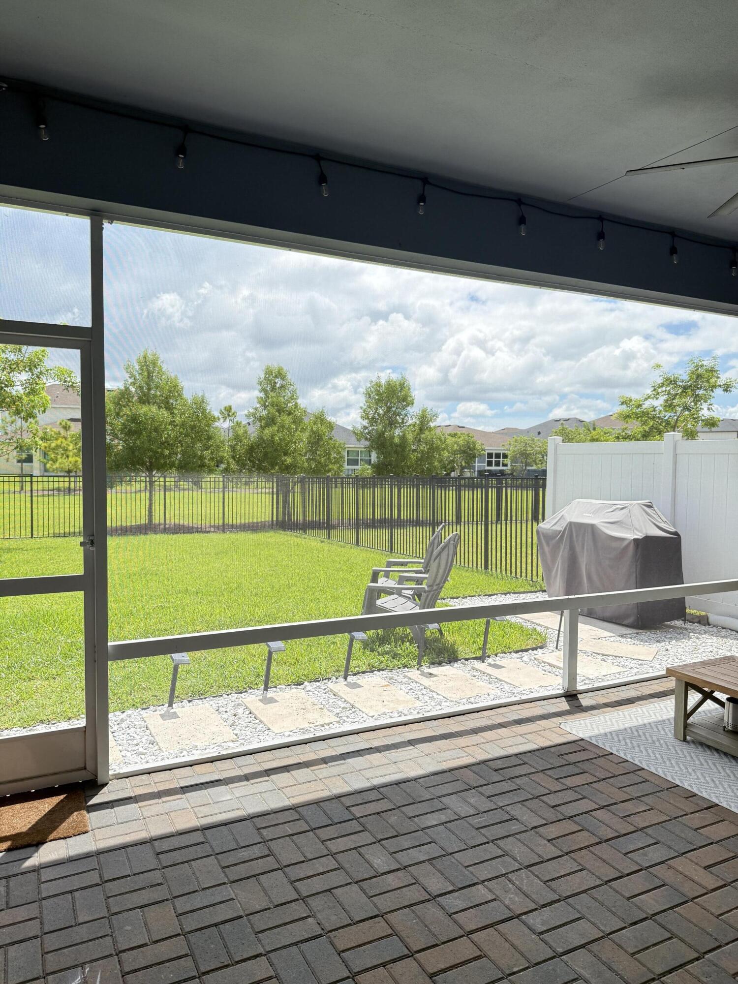 1382 Arrowhead Point Road Loxahatchee, FL 33470 - Photo 38 of 55 a view of swimming pool with a yard