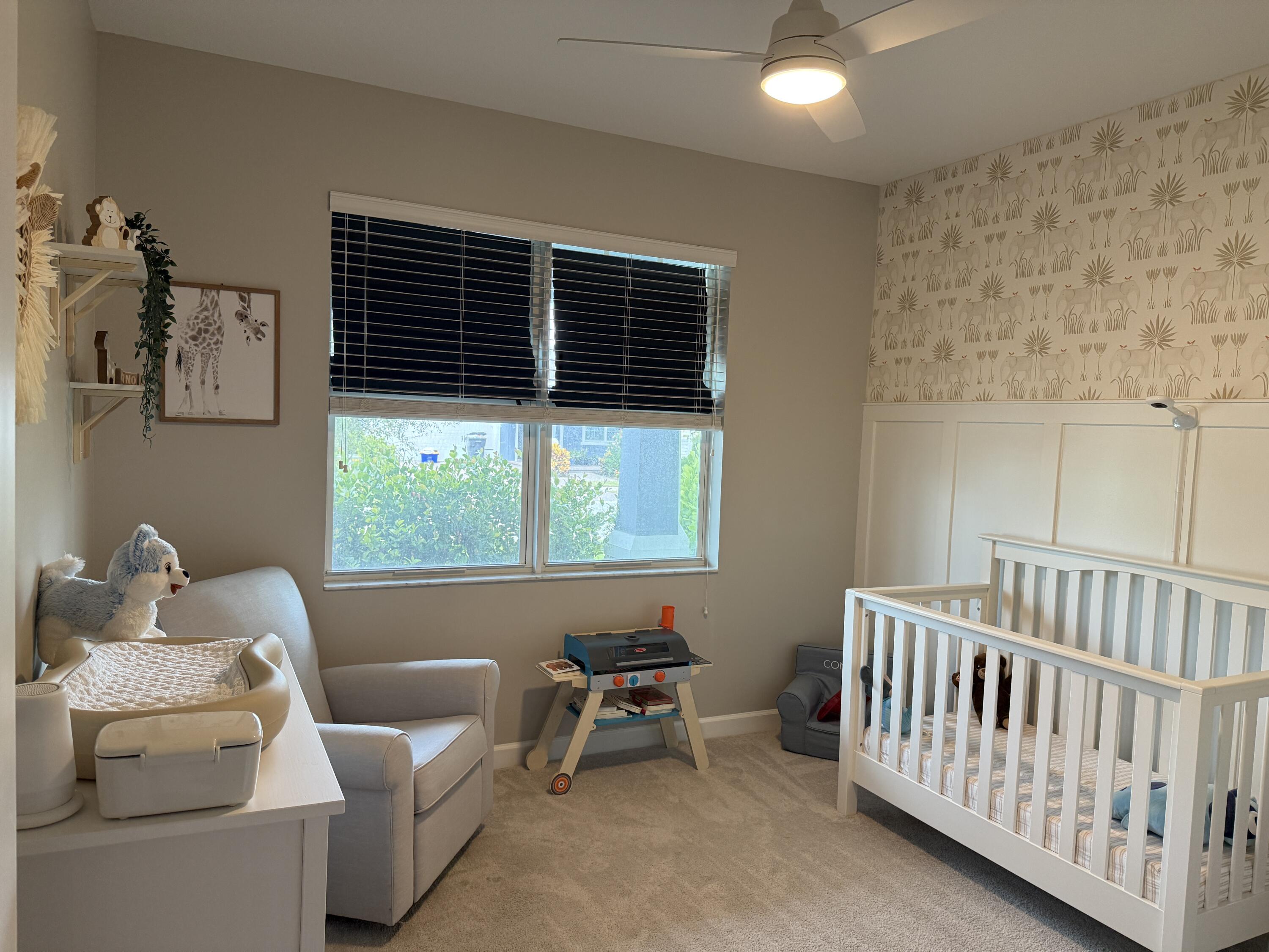 1382 Arrowhead Point Road Loxahatchee, FL 33470 - Photo 5 of 55 a bedroom with furniture and a window