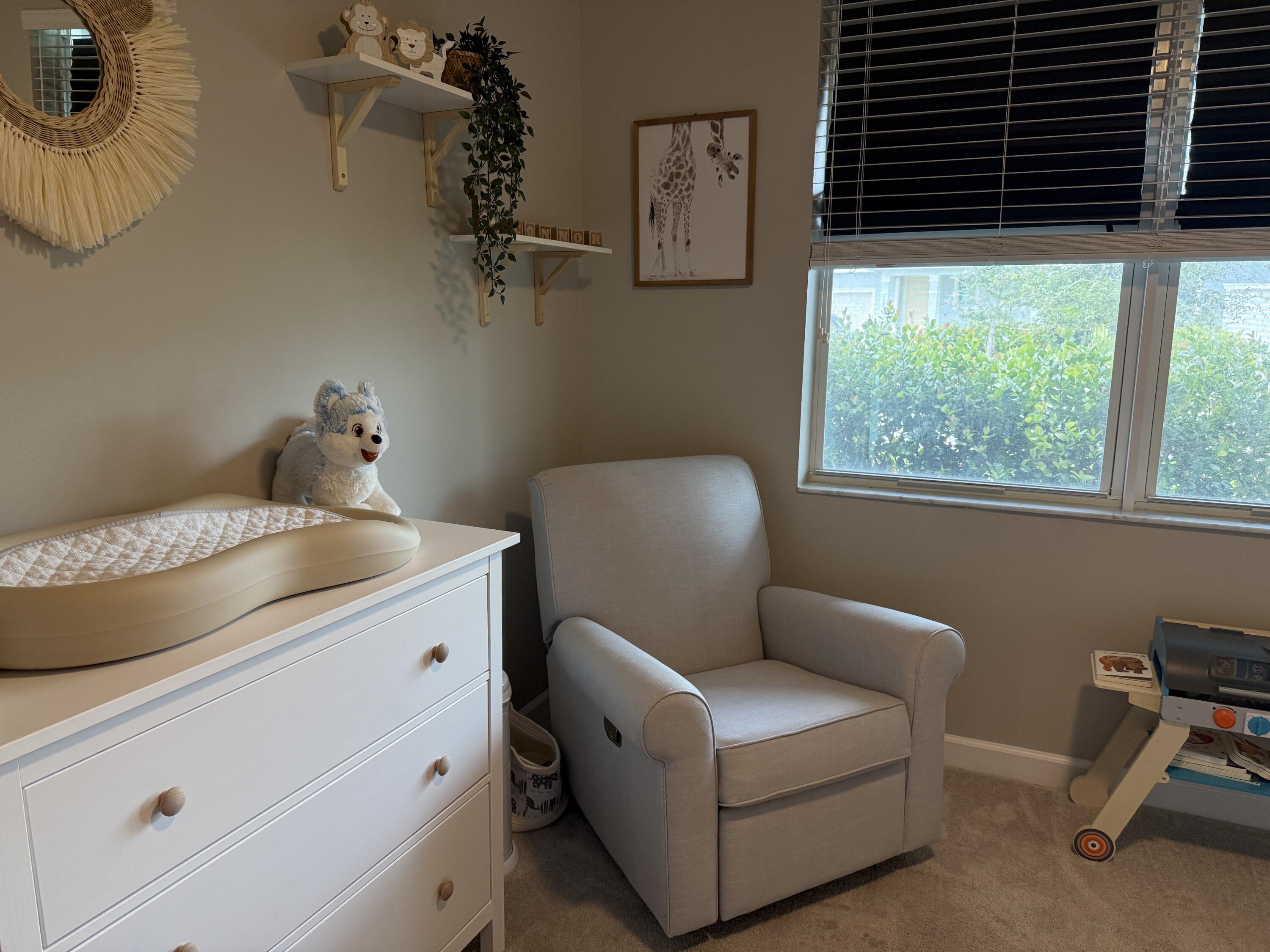 1382 Arrowhead Point Road Loxahatchee, FL 33470 - Photo 7 of 55 a living room with furniture and a window