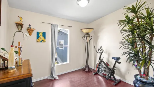 a view of a room with gym equipment