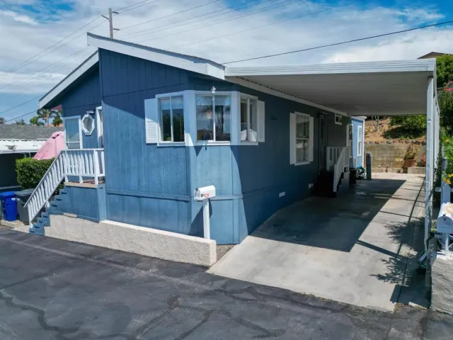 an aerial view of a house with a garage