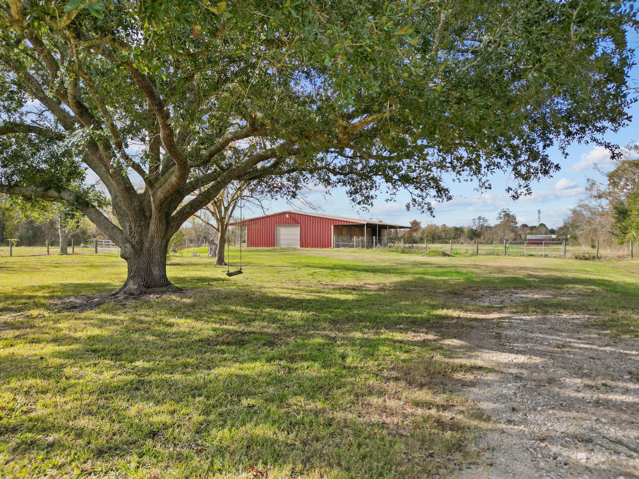 2720 County Road 159 Alvin, TX 77511 - Photo 1 of 12 a large garden with lots of trees