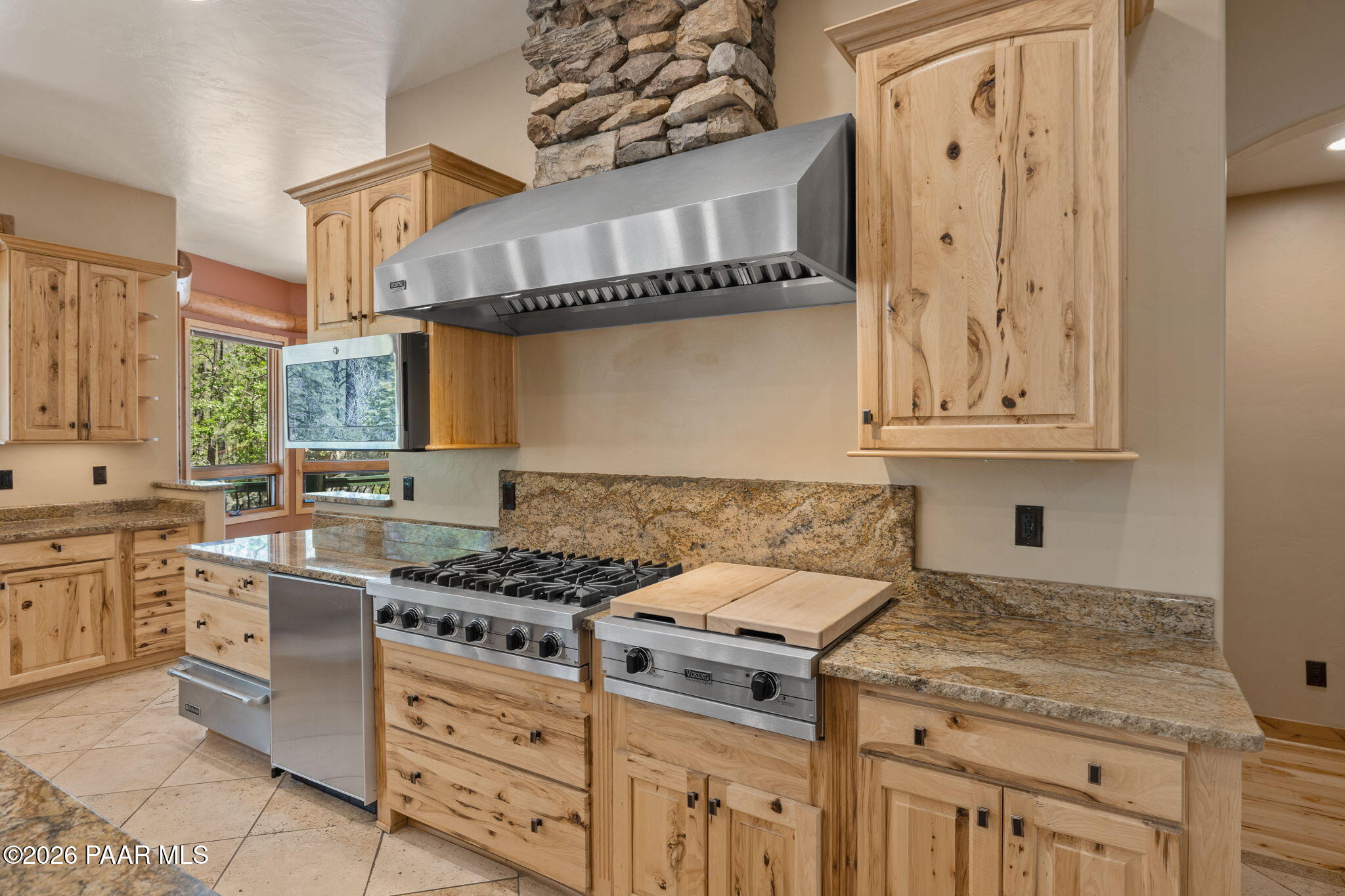 5140 East Charcoal Kiln Road Prescott, AZ 86303 - Photo 23 of 140 a kitchen with stainless steel appliances granite countertop a stove a sink and a microwave