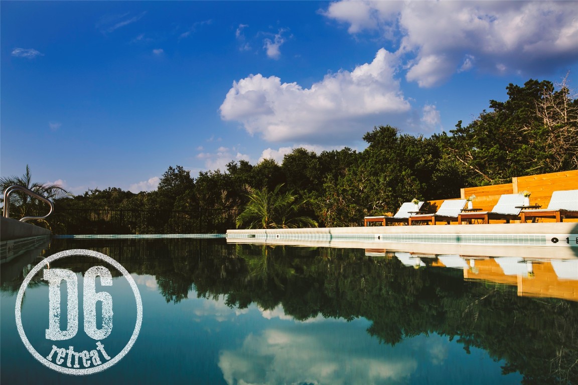 a view of swimming pool and lake