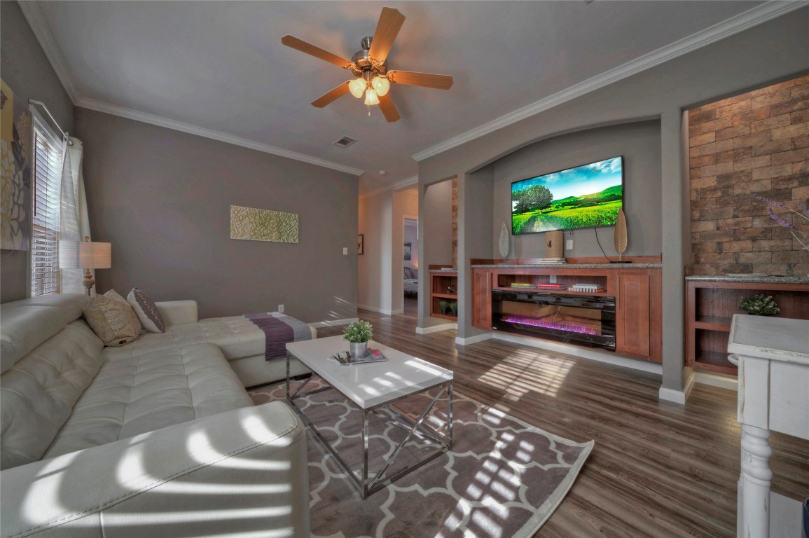 806 Bell Springs Road Dripping Springs, TX 78620 - Photo 12 of 34 a living room with furniture and a flat screen tv