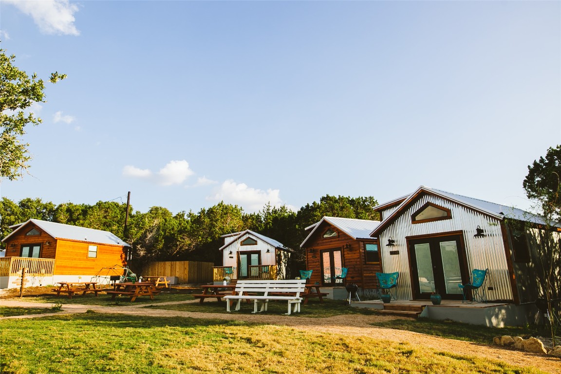 806 Bell Springs Road Dripping Springs, TX 78620 - Photo 29 of 34 a front view of a house with a yard