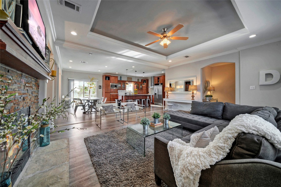 806 Bell Springs Road Dripping Springs, TX 78620 - Photo 10 of 34 a living room with furniture and a chandelier