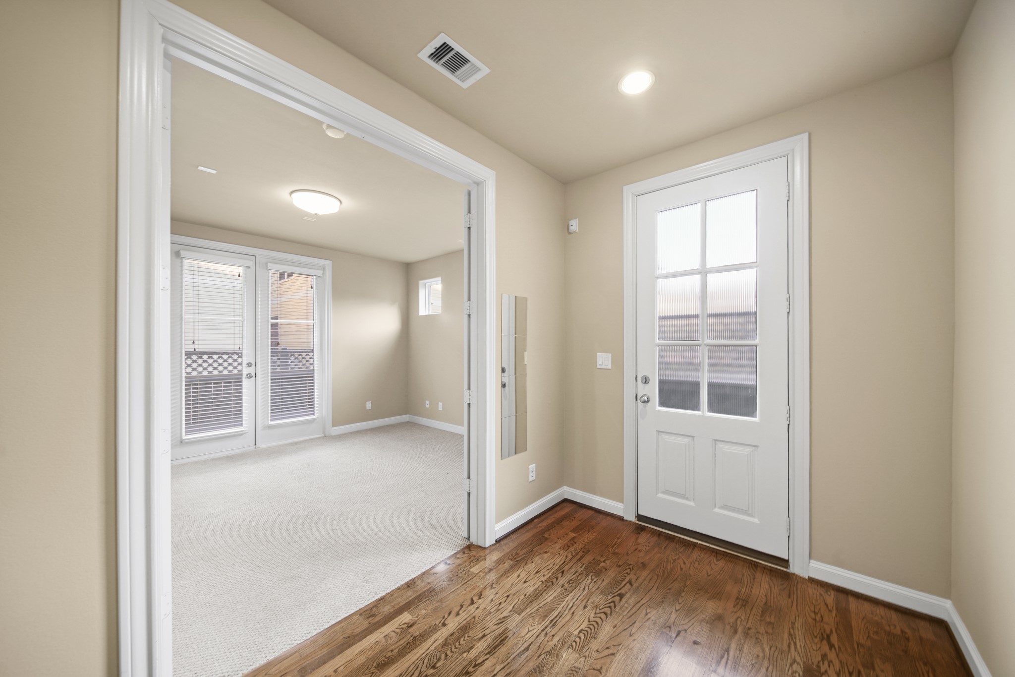 1250 West 23rd Street Houston, TX 77008 - Photo 6 of 50 The spacious foyer offers access to the garage and 1st floor guest suite!