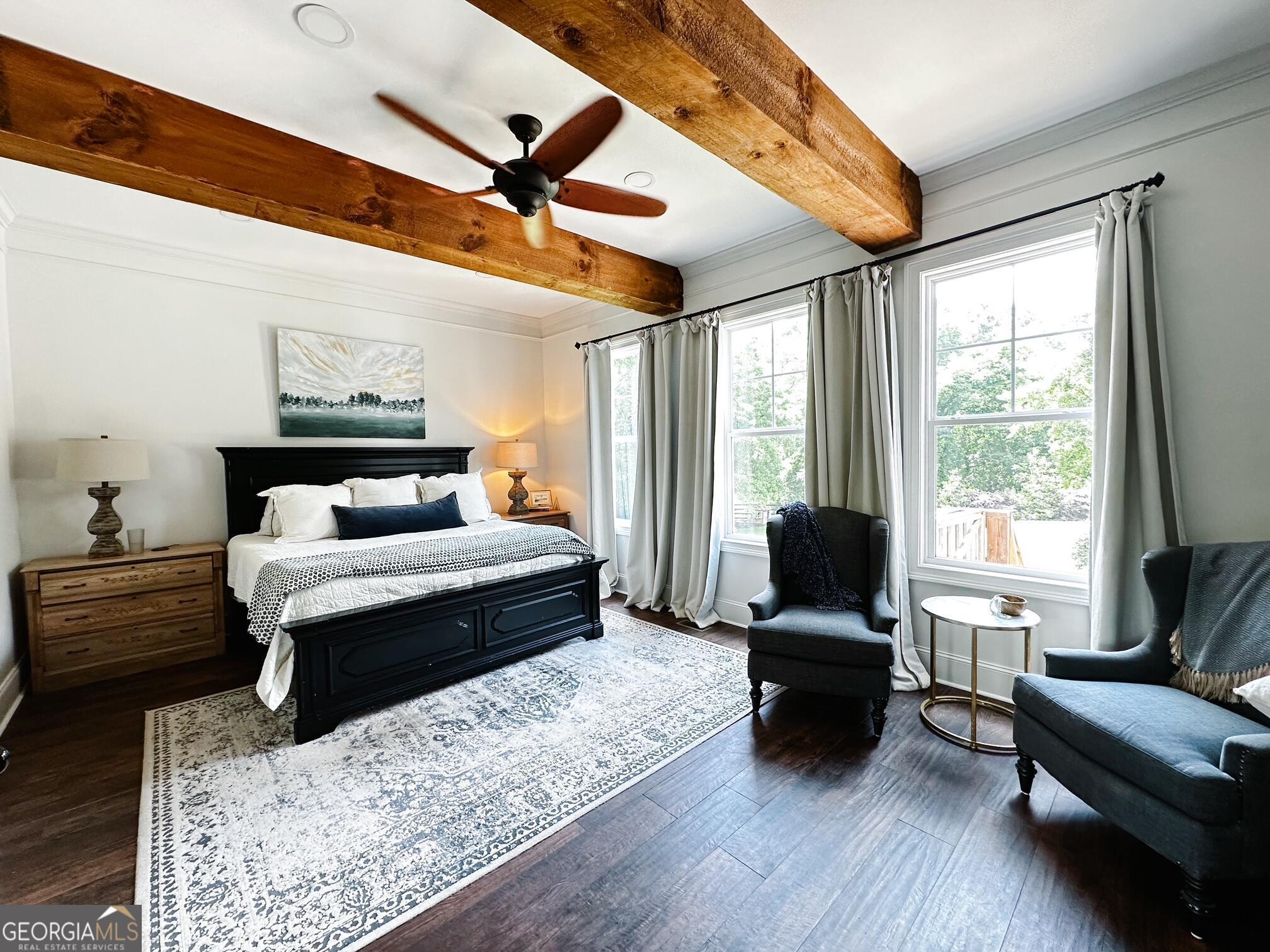 7093 Vaughn Road Woodstock, GA 30188 - Photo 12 of 41 a bedroom with a bed couch and a large window