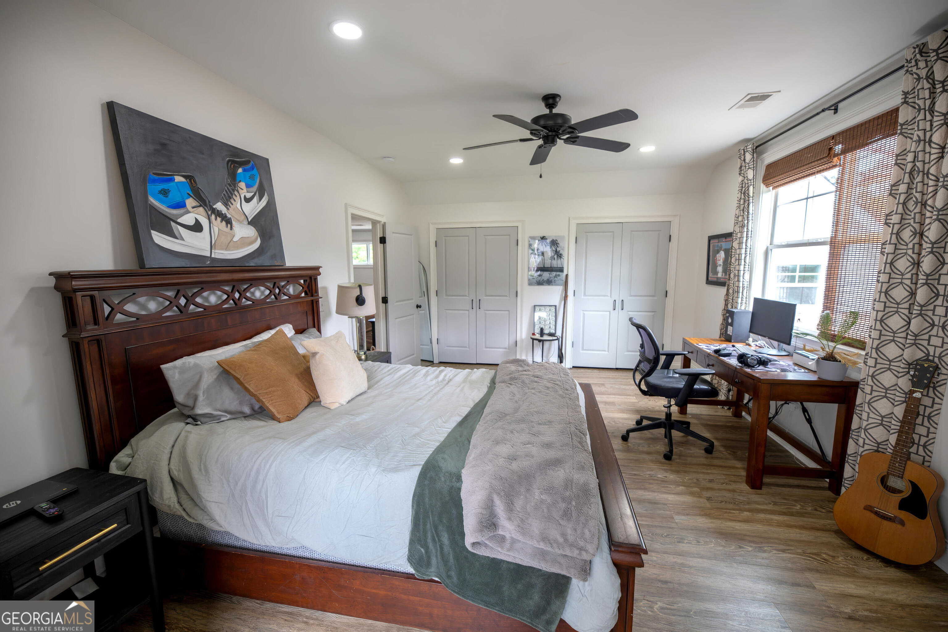 7093 Vaughn Road Woodstock, GA 30188 - Photo 23 of 41 a bedroom with a bed and a table