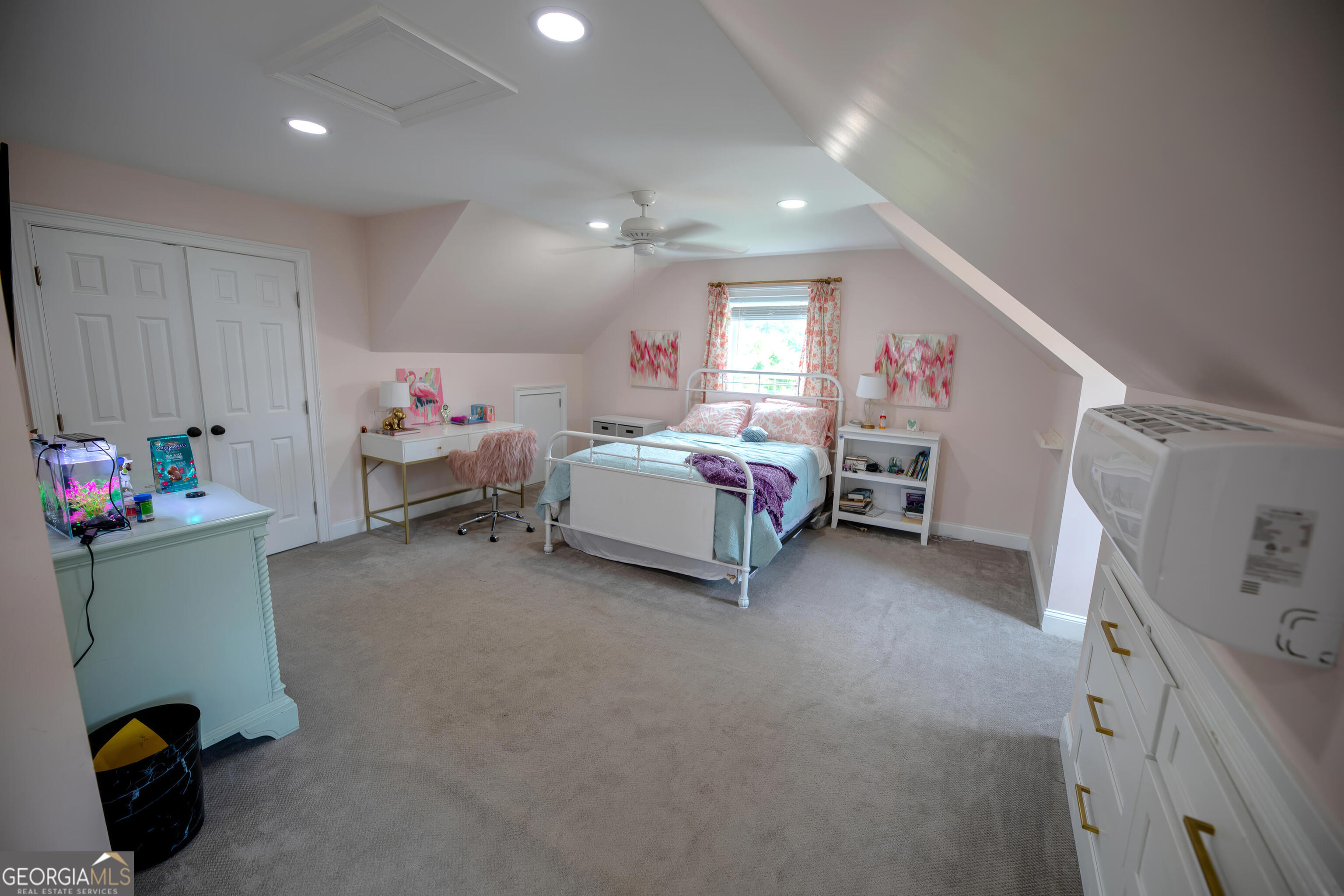 7093 Vaughn Road Woodstock, GA 30188 - Photo 26 of 41 a room with a bed and furniture