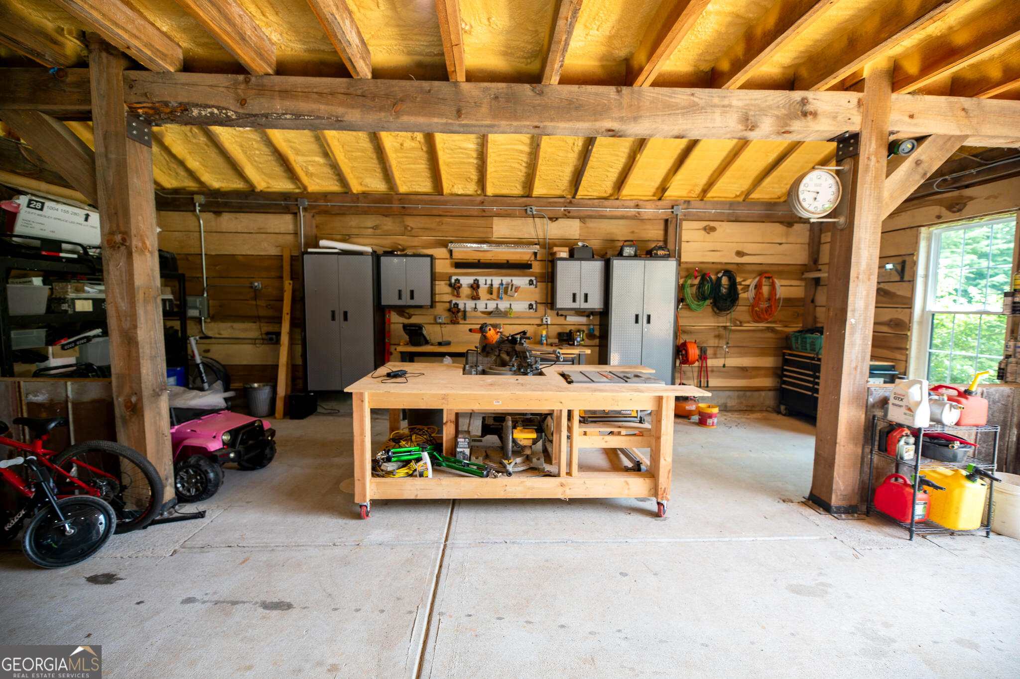 7093 Vaughn Road Woodstock, GA 30188 - Photo 30 of 41 a utility room with lot of and furniture