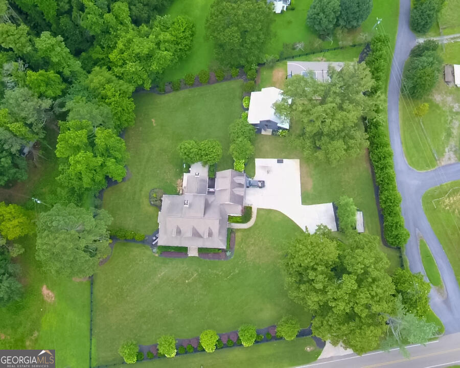 7093 Vaughn Road Woodstock, GA 30188 - Photo 40 of 41 an aerial view of a house