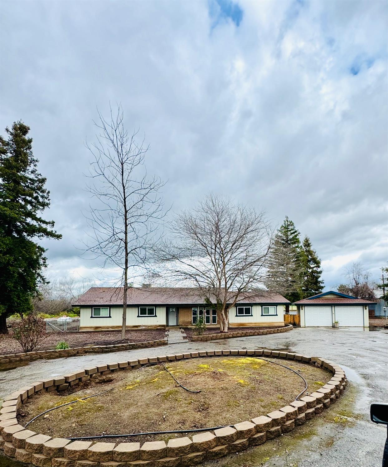 a view of a swimming pool with a yard