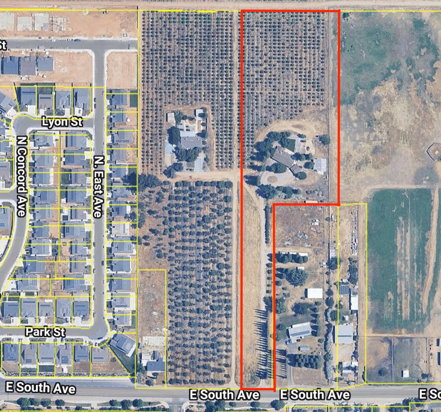 19342 East South Avenue Reedley, CA 93654 - Photo 2 of 29 a view of a city with tall buildings