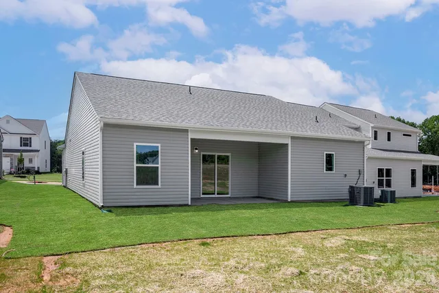 a view of a house with a garden