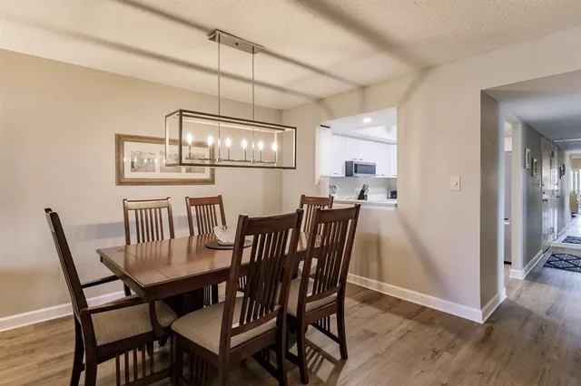 a spacious bedroom with a bed and a window