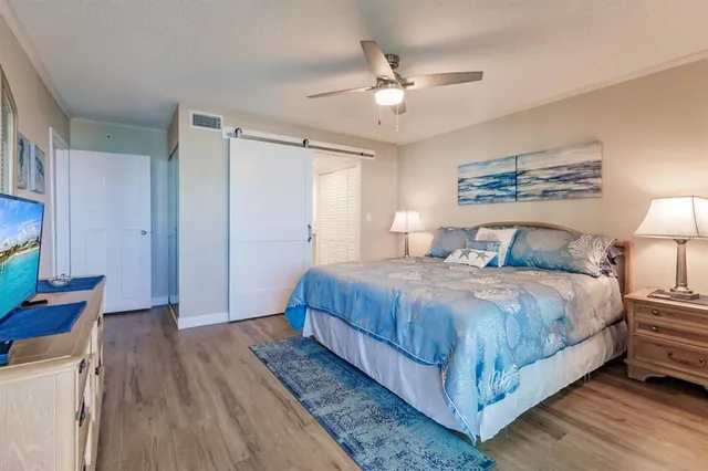 a bathroom with a toilet sink a shower and