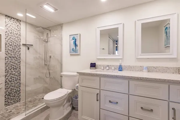 a bedroom with bed and window