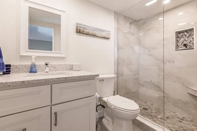 a dining room with furniture window and wooden floor