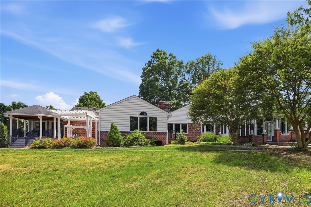 13300 West Patrick Henry Road Doswell, VA 23047 - Photo 3 of 69 Expansive rear lawn with mature trees