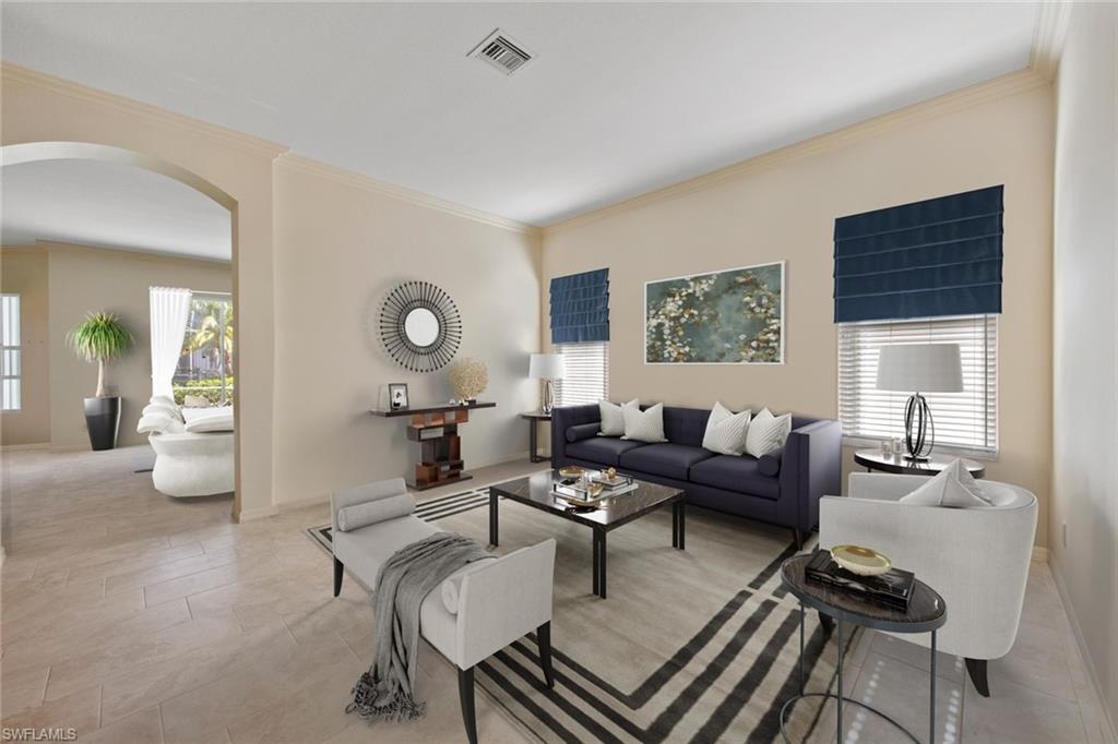 9097 Springview Loop Estero, FL 33928 - Photo 1 of 50 a living room with furniture and wooden floor