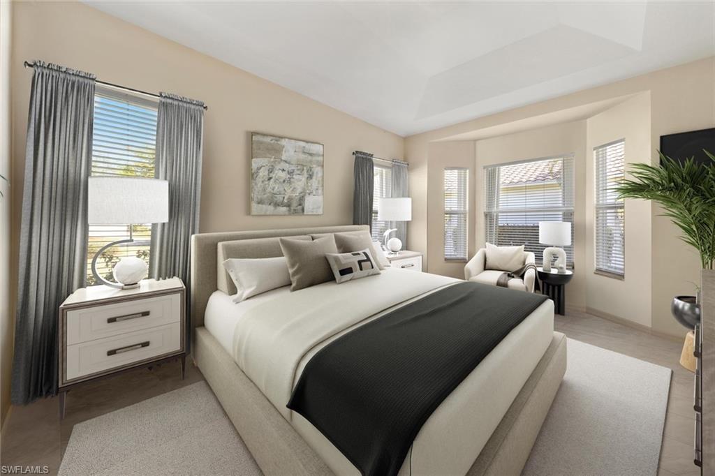 9097 Springview Loop Estero, FL 33928 - Photo 24 of 50 a bed room with a bed and a window