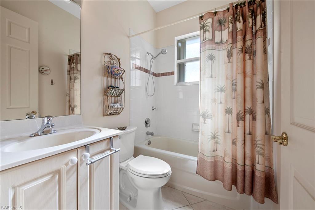 9097 Springview Loop Estero, FL 33928 - Photo 30 of 50 a bathroom with a sink toilet and shower